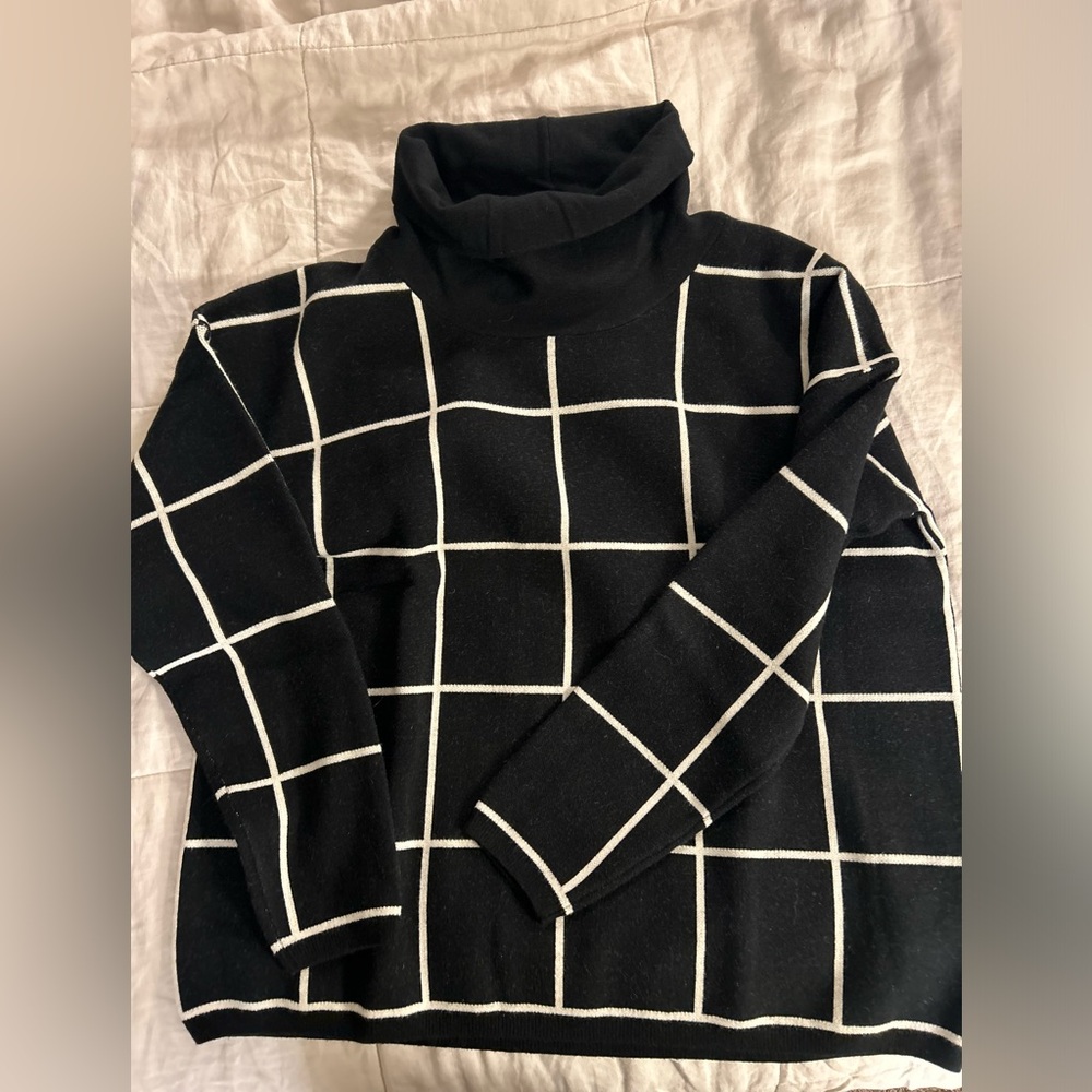 Black and cream sweater